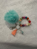 multicolored felted pompom wristlet/keychain