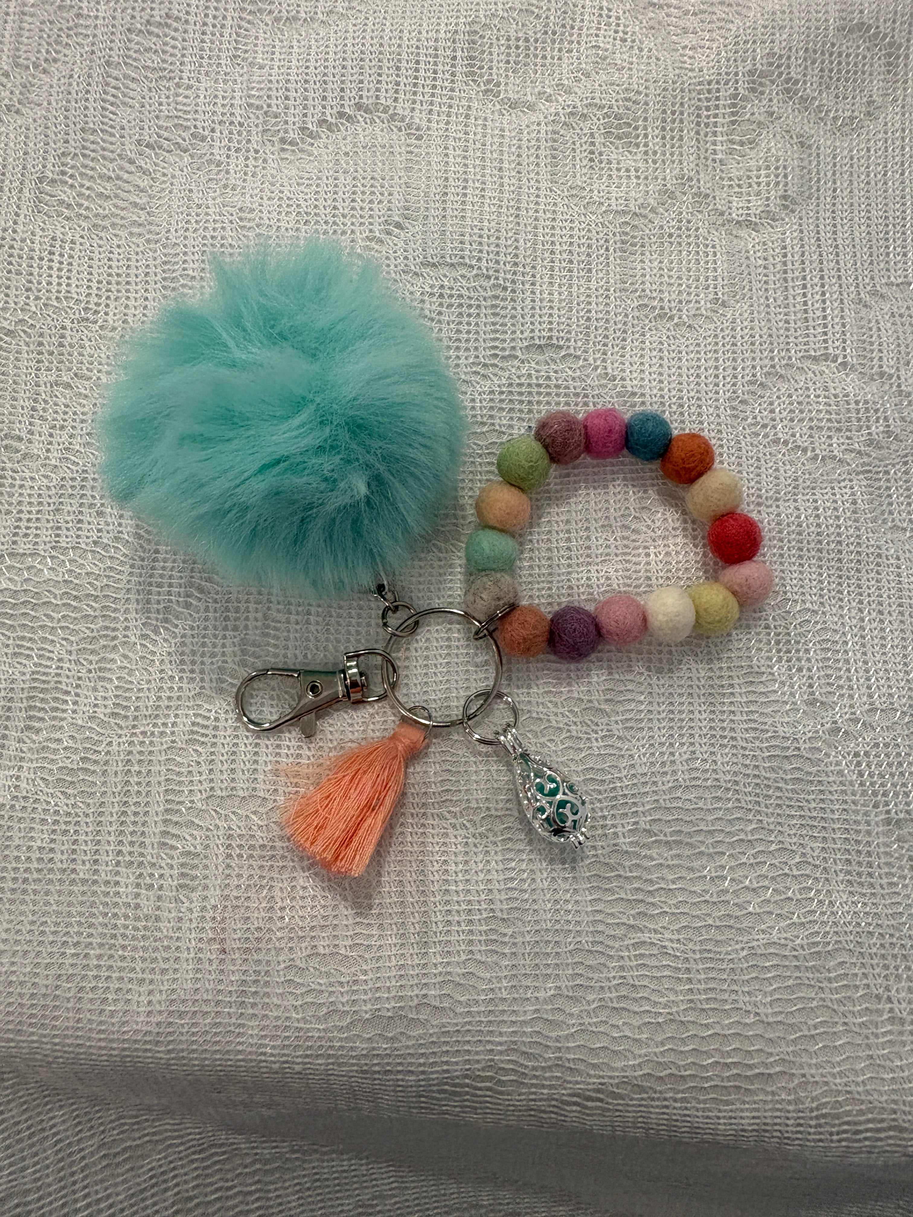 multicolored felted pompom wristlet/keychain