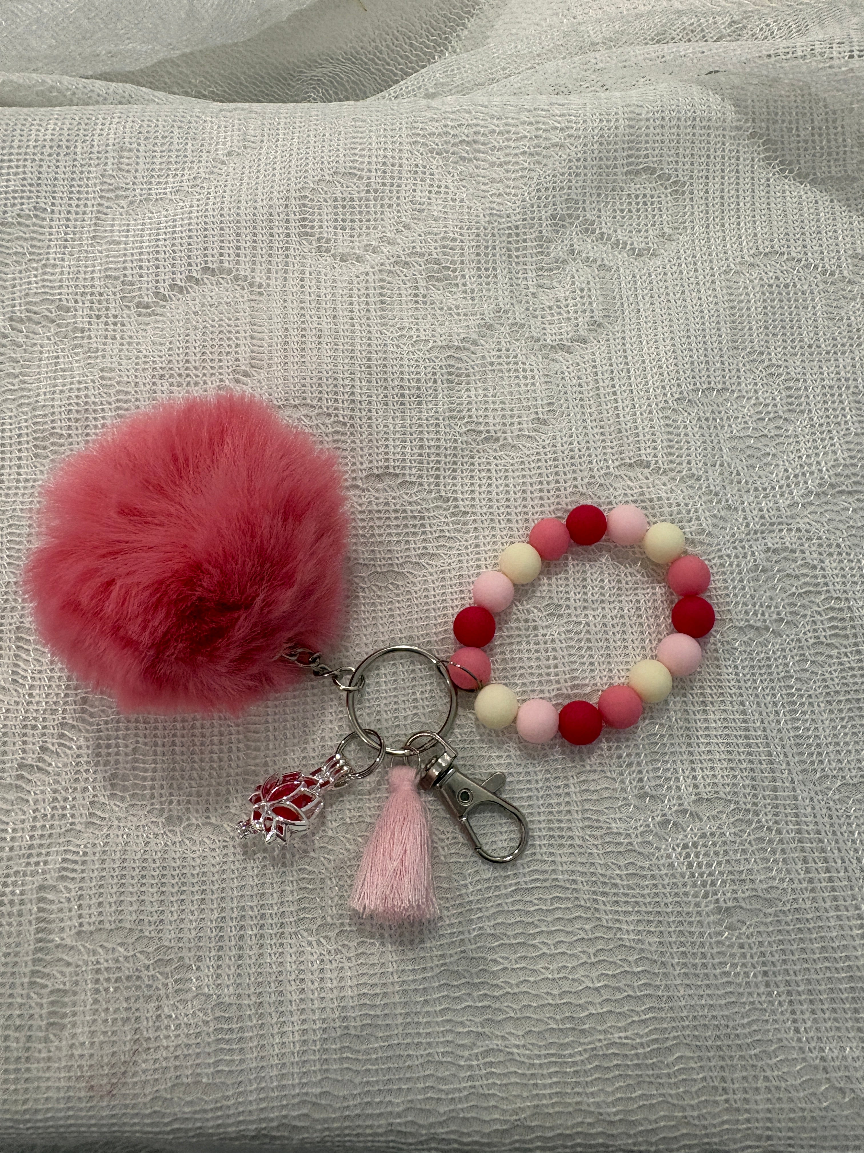 pink and white beaded diffuser wristlet/keychain